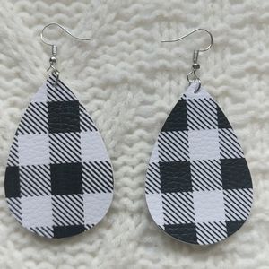2/$20 white and black checkered faux leather earri